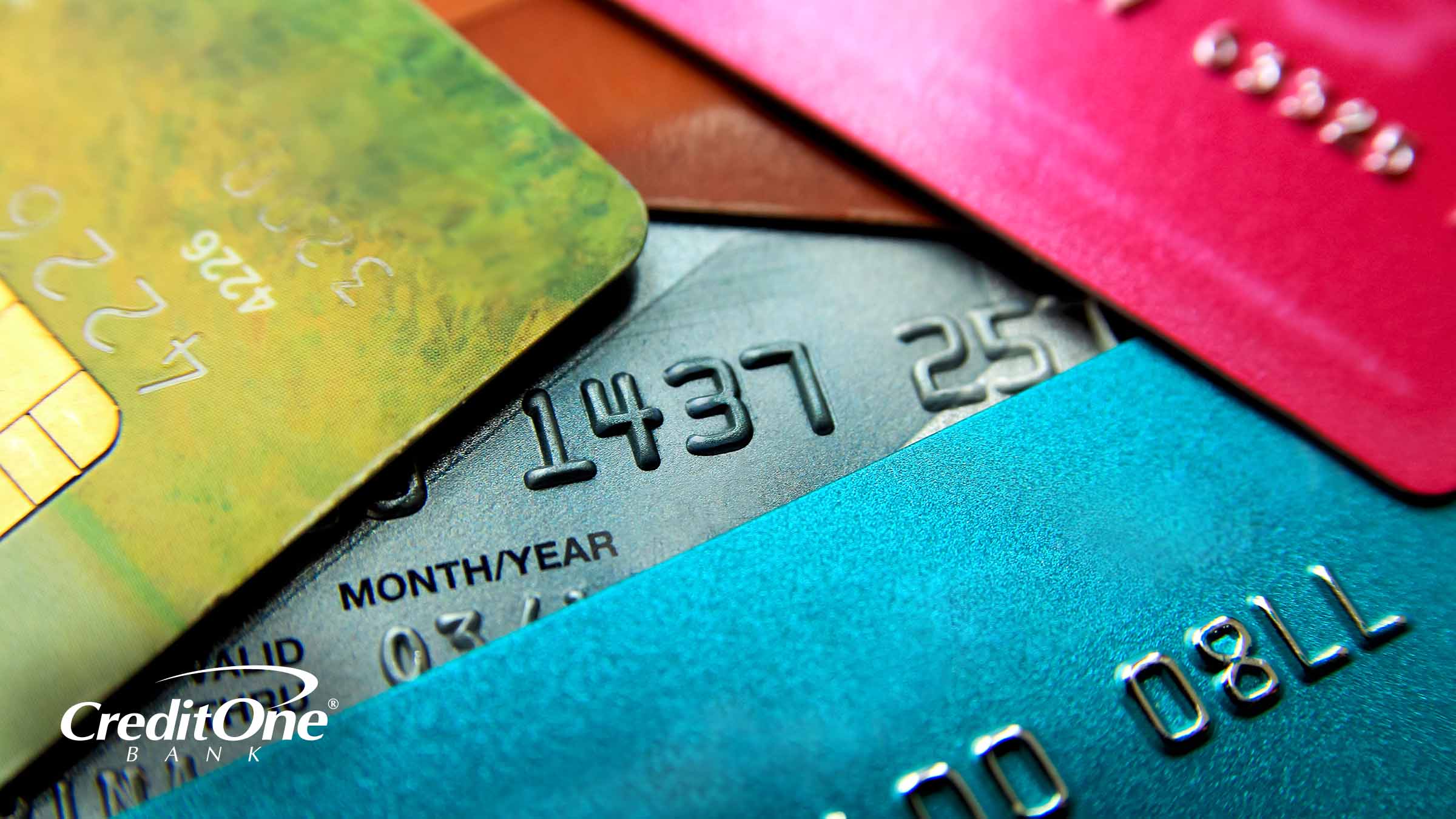 A close-up view of a stack of miscellaneous credit cards represents potentially using one credit card to pay off another.