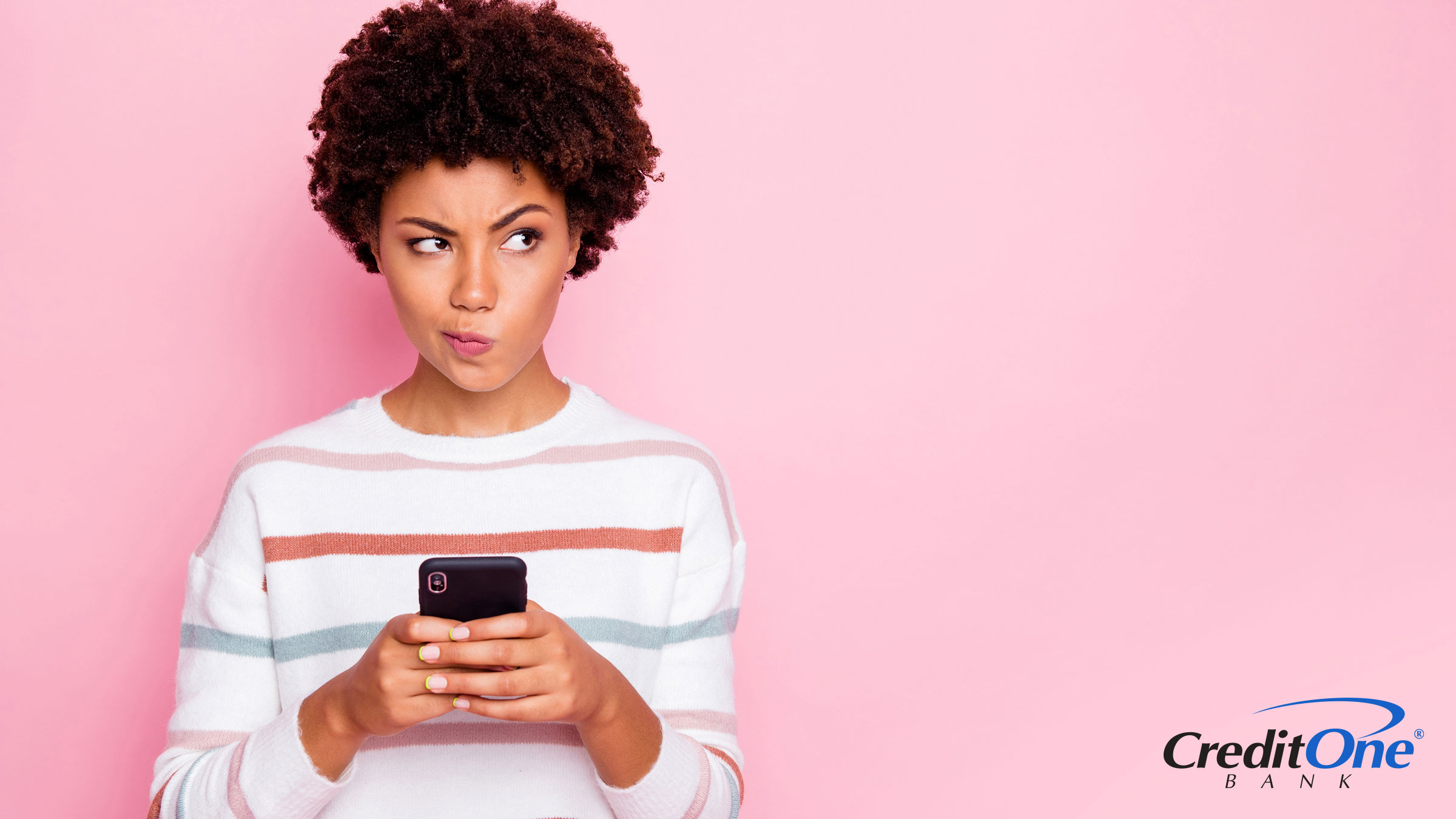 A woman on her mobile phone makes a ponderous expression, wondering if it is possible to use buy now, pay later with bad credit