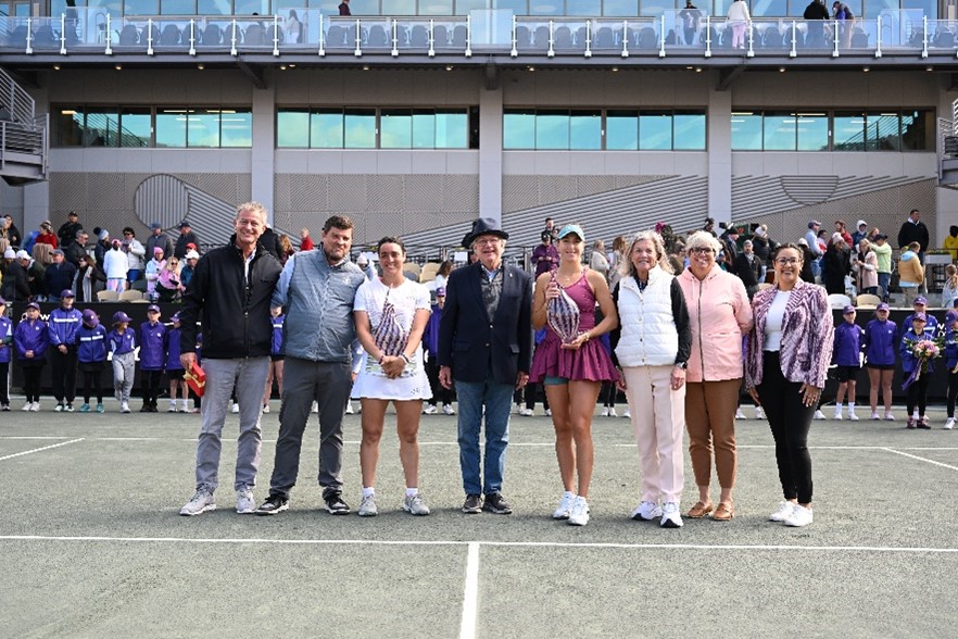 Attendees and players of the Charleston Open pose for pictures in Credit One Stadium